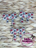 (DISCONTINUED) BEADABLE JUMBO SILICONE BOW RED BOWS AND FOOTBALLS (1ct)